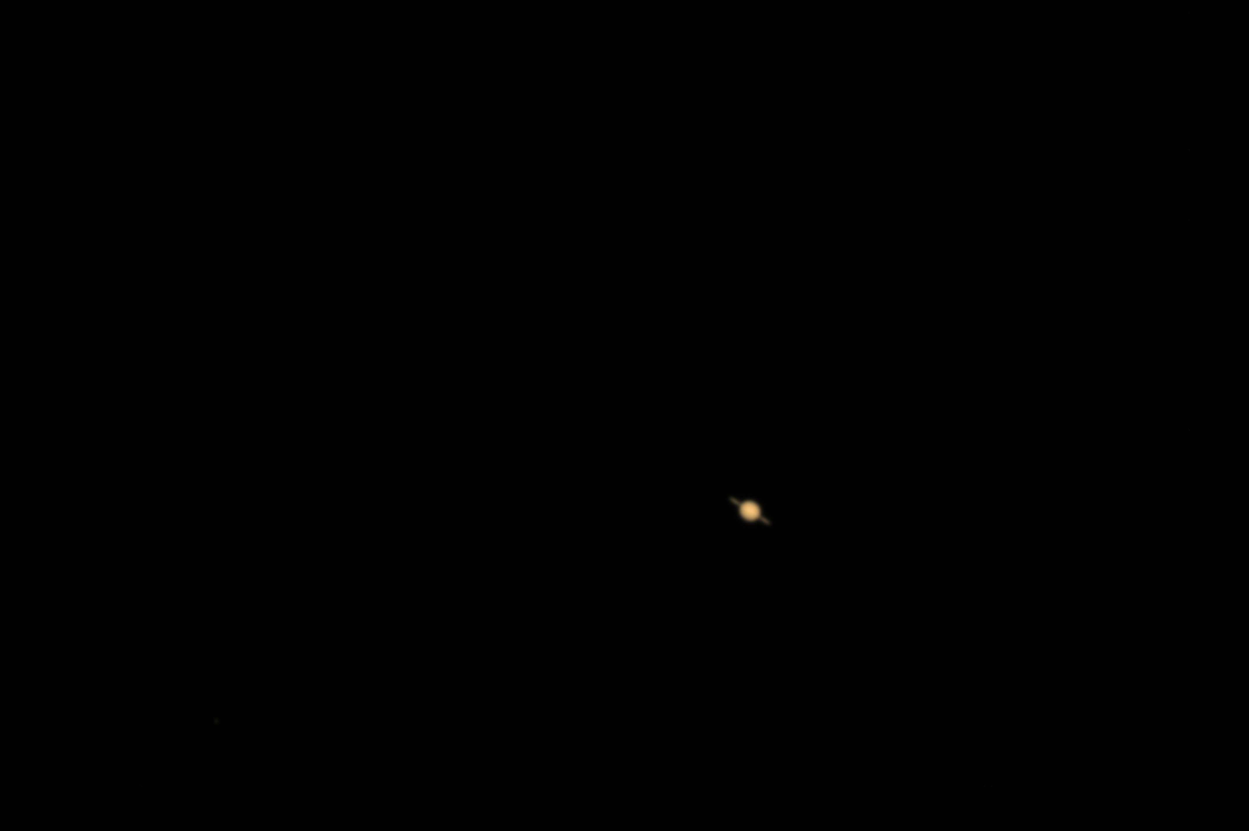 A fairly low-res shot of Saturn, but you can still make out the rings.