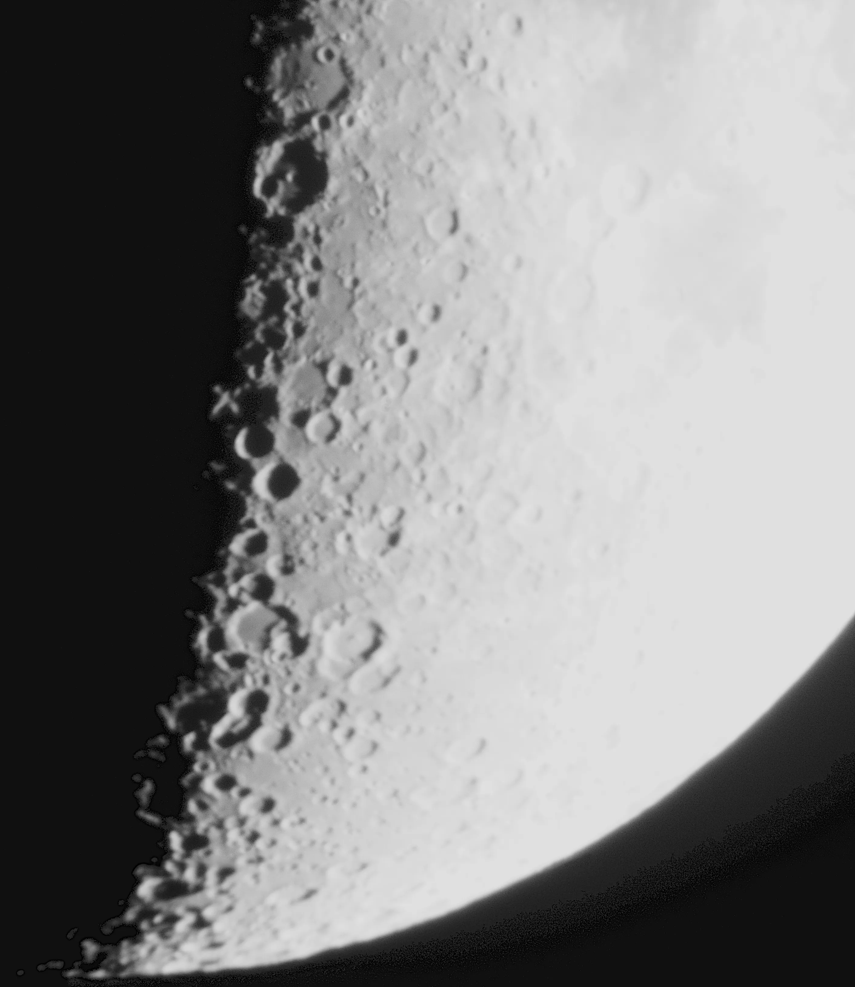 The moon with an x made of craters in the middle.